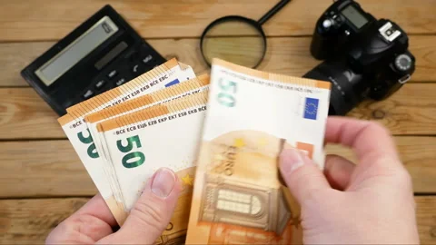 Digital camera and money, store selling photographic equipment, pawnshop conc Stock Footage 149694992