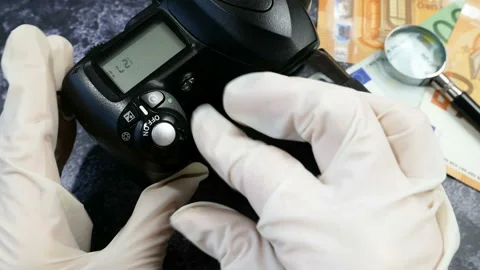 Digital camera and money, store selling photographic equipment, pawnshop Stock Footage 150967952