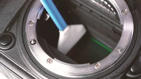 Digital camera. Cleaning the digital matrix in the camera. Video stock 152726332