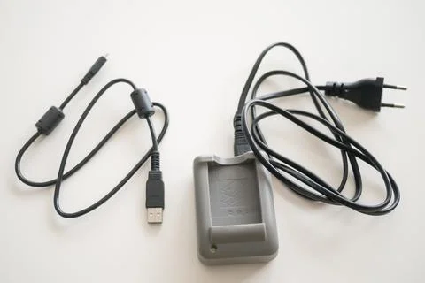 Digital camera connection cable and charger Stock Photos