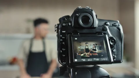 Digital Camera Filming Cooking Show of Two Food Bloggers Video stock 262340672