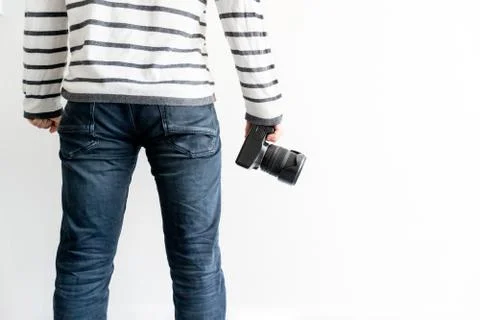 Digital camera in a hand Stock Photos