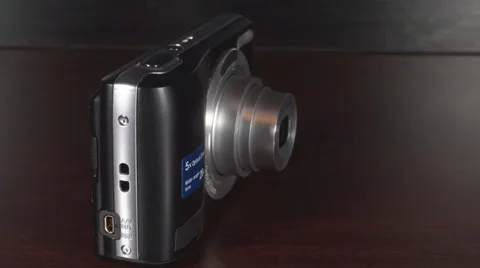 Digital Camera Lens Turning Off Medium Side-Shot Stock Footage 36034960