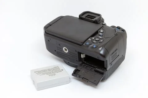 Digital camera with open battery compartment Stock Photos