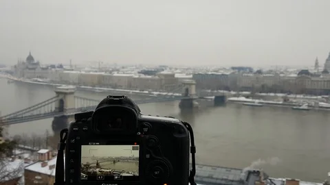 Digital cameras and the old Budapest city view at winter time Stock Footage 104128182