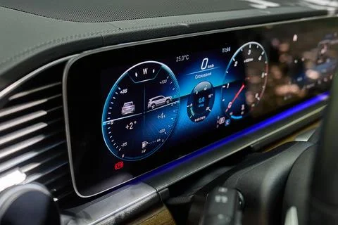 Digital car dashboard display with speedometer and controls Stock Photos