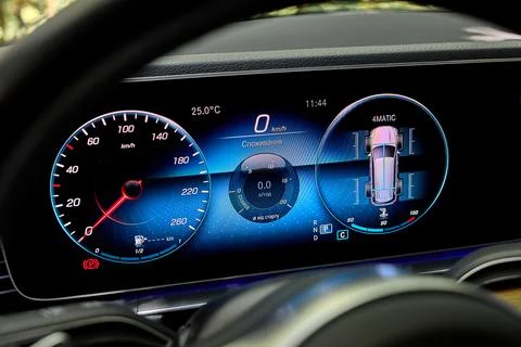 Digital car dashboard with speedometer and driving display Stock Photos