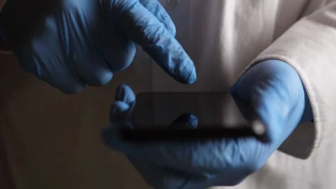 Digital Clinic Checkin, Reception Verifies Appointment Online, Healthcare Staff Stock Footage 327335852