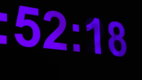 Digital clock countdown in 4k showing various times in a dark setting Stock Footage 331235625
