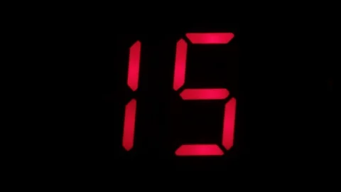 Digital clock countdown from sixteen to zero. Digital timer in red color over Stock Footage 81330273