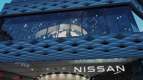 Digital Clock Display on Modern Commercial Building Facade in Tokyo Stock Footage 337782635