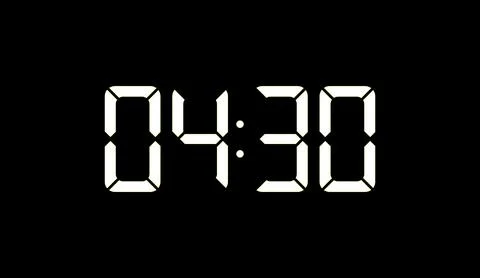 Digital clock display showing four thirty in bright white numbers against a Stock Illustration