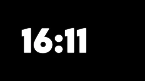 Digital clock displaying 1855 on black background with glowing white numbers Stock Footage 326663656