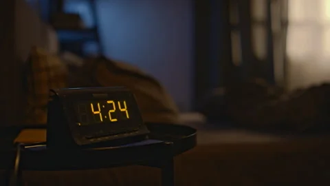 Digital Clock on Nightstand at Half Past Four in Morning Stock Footage 279759007