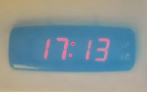 Digital Clock Showing 17:13 Time On Electronic Display Thailand. Stock Photos