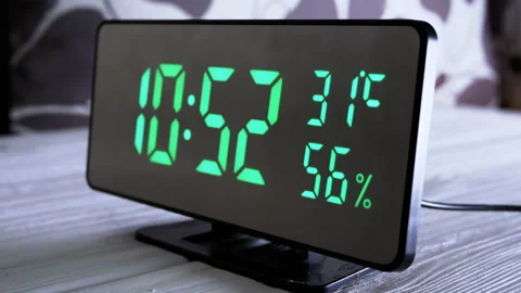 Digital Clock Showing Time on Green Disp... | Stock Video | Pond5