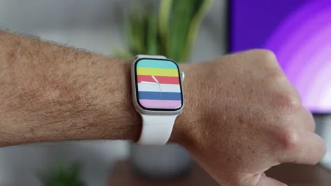 Digital clock time on Apple Watch Series 8 on wrist Stock Footage 265451140