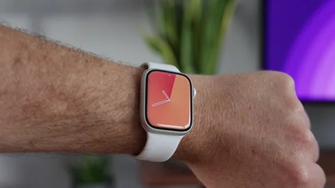 Digital clock time on Apple Watch Series 8 on wrist Stock Footage 265451141