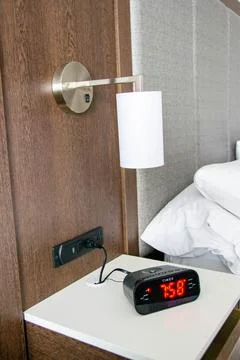 Digital clock on the wall Stock Photos