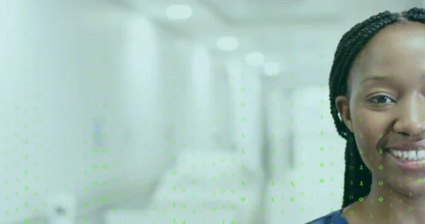 Digital code flowing over female clinician standing in corridor revealing Stock Footage 315527993