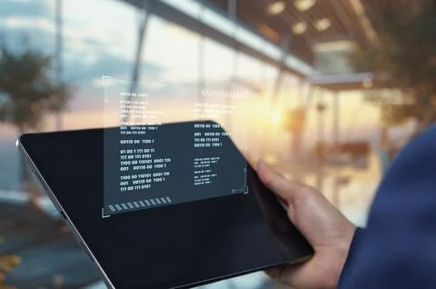 Digital Coding Display on Tablet in Modern Workspace Context Photos