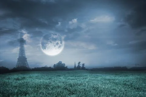 Digital composite of Bright moon over paris Stock Photos