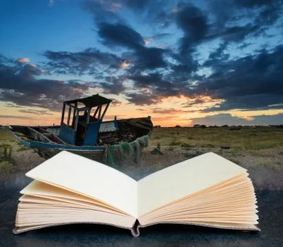 Digital composite concept image of open book wth Abandoned fishing boat on be Stock Photos