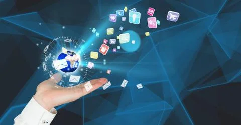 Digital composite of hand with earth over and application icons coming up for Stock Photos