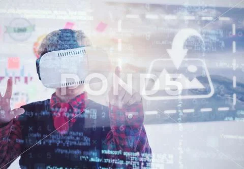 Digital composite image of boy as business executive using virtual reality PSD Template