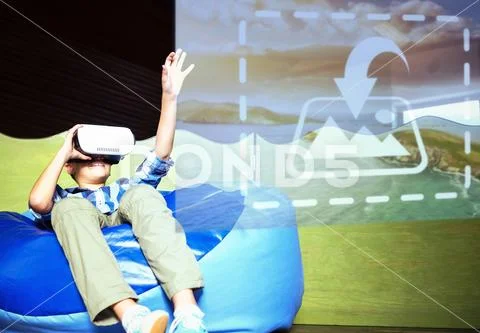 Digital composite image of boy sitting on bean bag and using virtual reality PSD Template