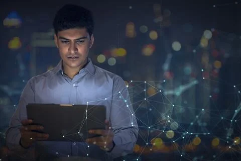 Digital Composite Image Of Businessman Using a digital tablet Stock Photos