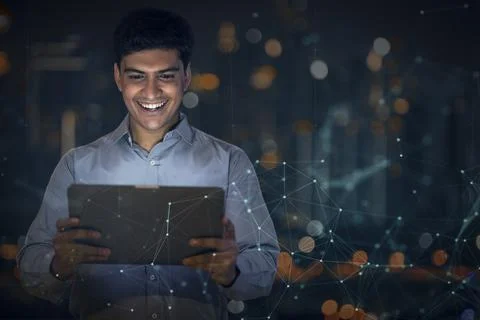 Digital Composite Image Of Businessman Using a digital tablet Foto stock