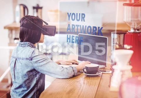 Digital composite image of a businesswoman using a virtual reality device in the Modello PSD