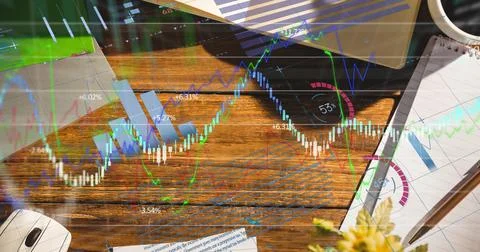 Digital composite image of financial data processing office equipment on office 库存照片