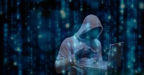 Digital composite image of hacker using credit card and laptop Illustrazione stock