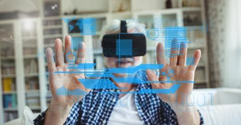 Digital composite image of man using VR glasses Stock Photos
