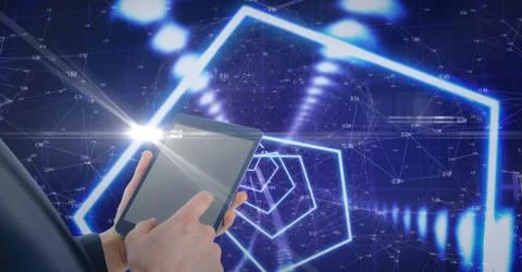 Digital composite image of man using tablet computer with tech graphics in Stock Photos