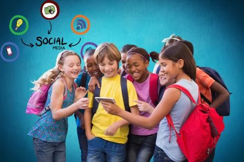 Digital composite image of school students looking at smart phone with various Foto stock