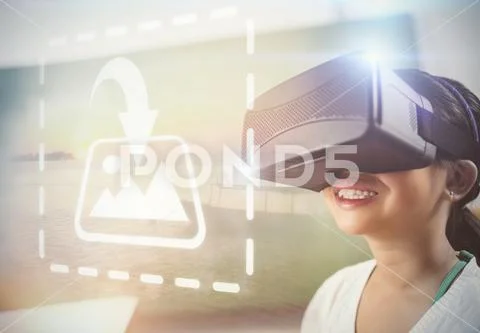 Digital composite image of a smiling girl using a virtual reality device at PSD Template