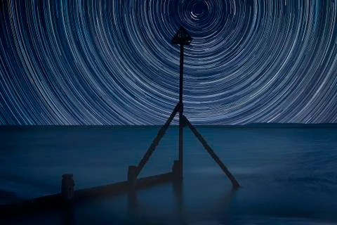 Digital composite image of star trails around Polaris with Beautiful vibrant  Stock Photos