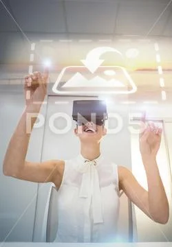 Digital composite image of a young woman using a virtual reality device of woman Modello PSD