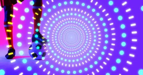 Digital composite of soccer player with concentric neon pattern against colorful Foto stock