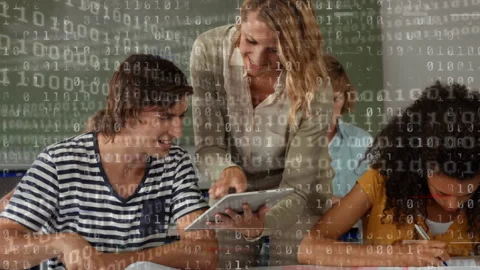 Digital composition of binary coding data processing against female teacher and 스톡 동영상 148085492