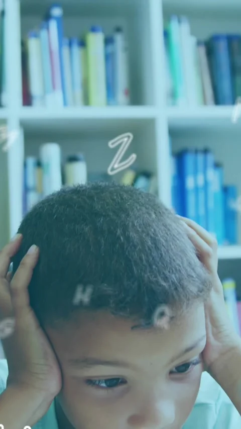 Digital composition of multiple alphabets floating against boy covering his ears Stock Footage 343824776