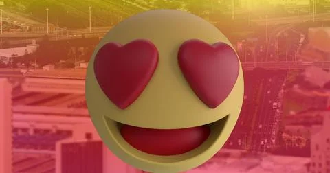 Digital composition of multiple changing face emojis against cityscape in Fotos de archivo