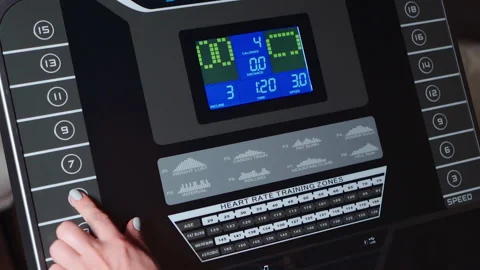 Digital console screen of elliptical cross trainer machine or treadmill Stock Footage 318624680