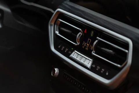 Digital control panel car air conditioner dashboard. Modern car interior cond Stock Photos
