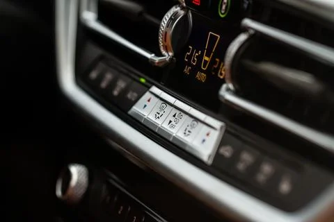 Digital control panel car air conditioner dashboard. Modern car interior cond Stock Photos