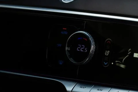 Digital control panel car air conditioner dashboard. Modern car interior cond Stock Photos
