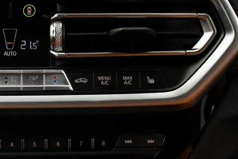 Digital control panel car air conditioner dashboard. Modern car interior cond Stock Photos